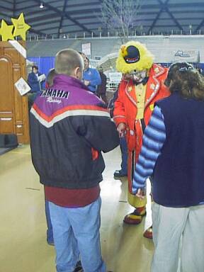 Clown Entertaining Children at Upper Peninsula Builder's Show